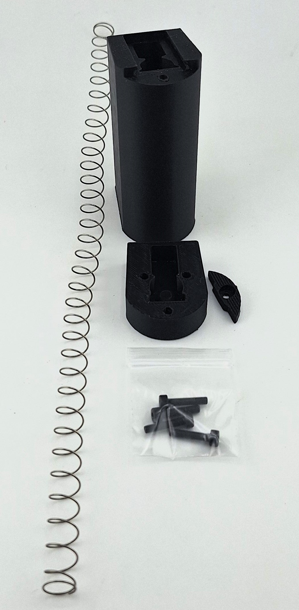 Taurus TX22 magazine extension with 15-round capacity, spring, screws, and installation parts for increased firepower and durability