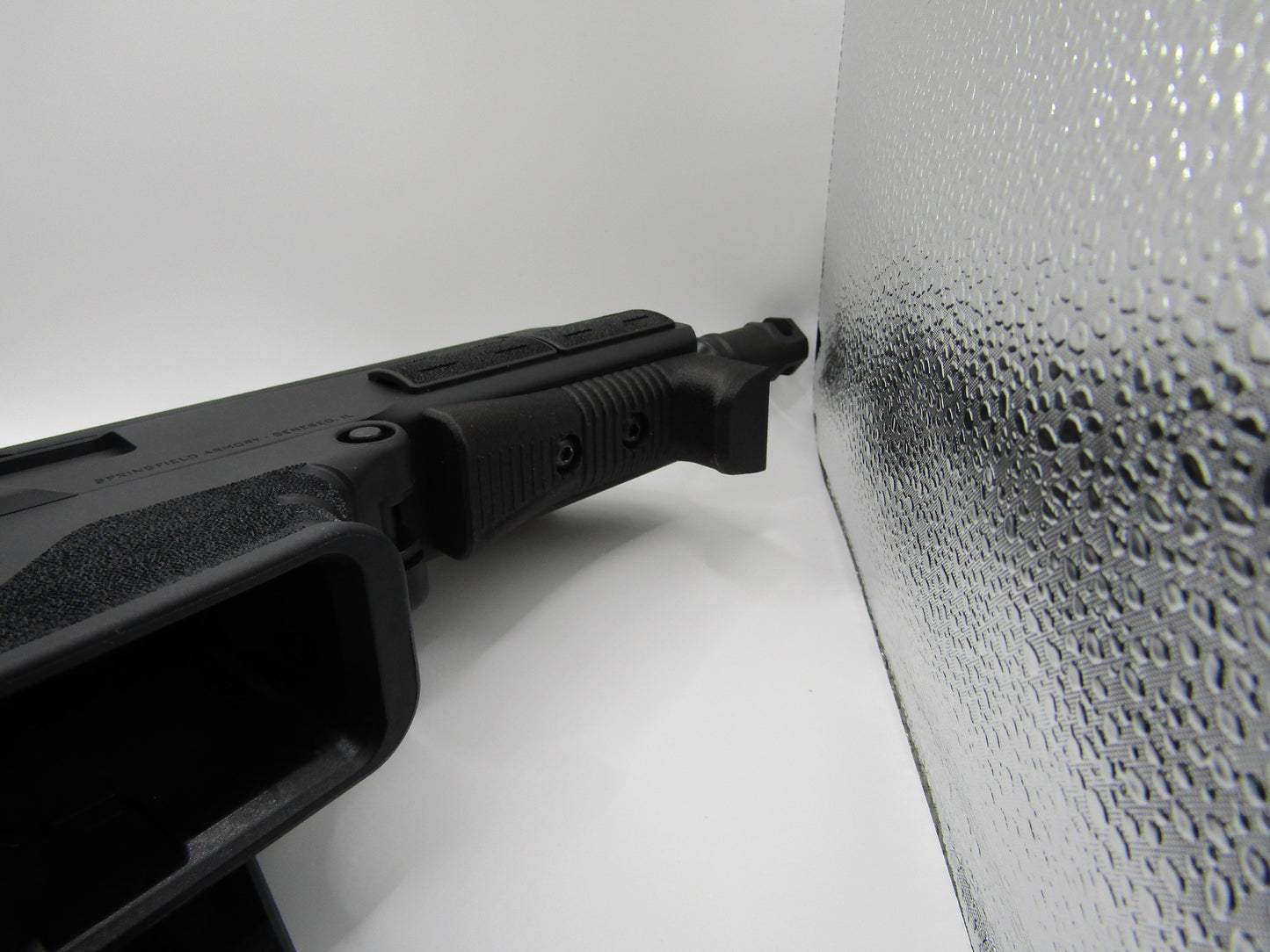 Springfield Kuna angled foregrip handstop mounted on rifle rail for improved control and recoil management