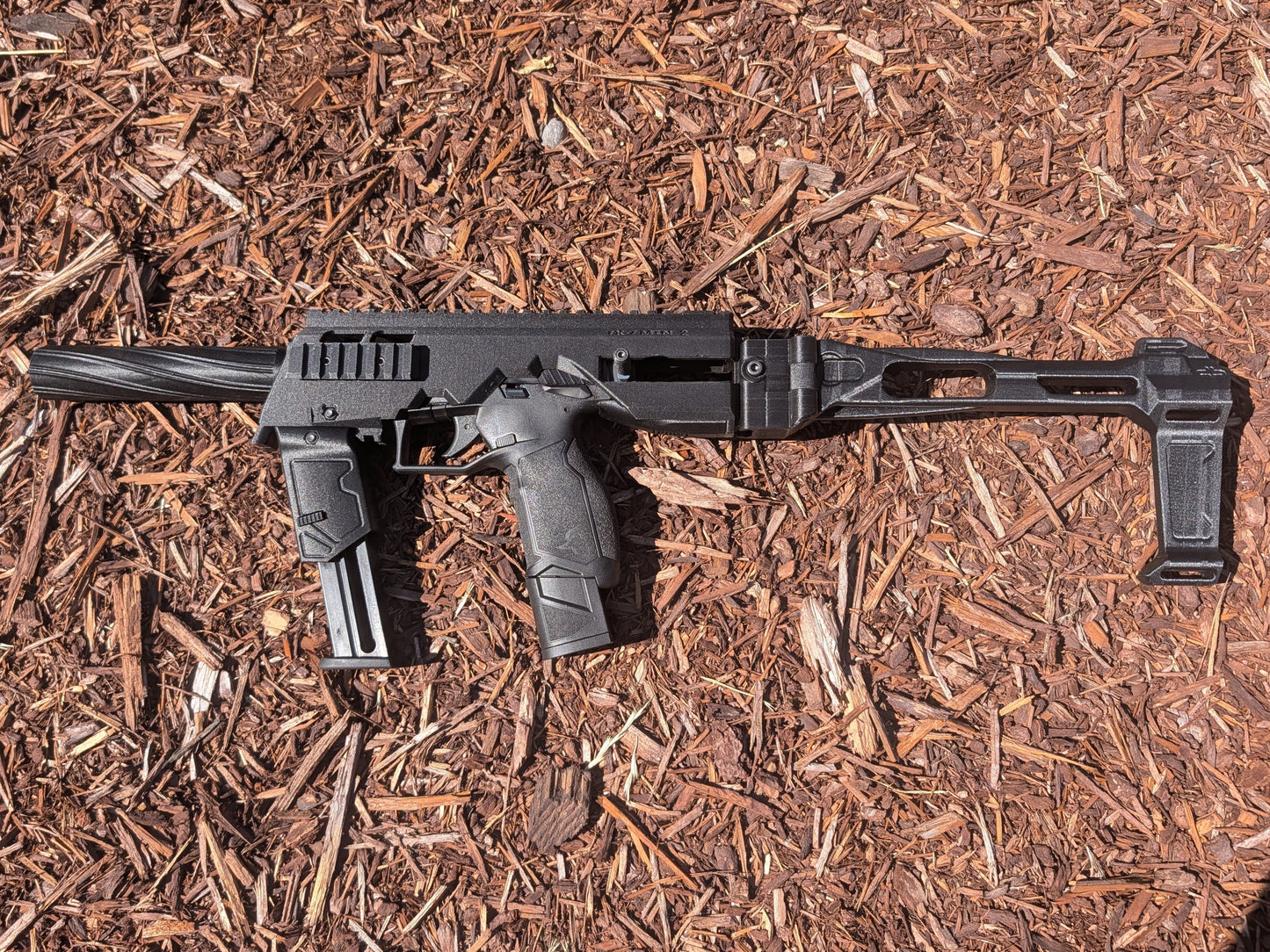 TX22 MTN2 chassis and folding brace upgrade with lockplate and push-button mag holder