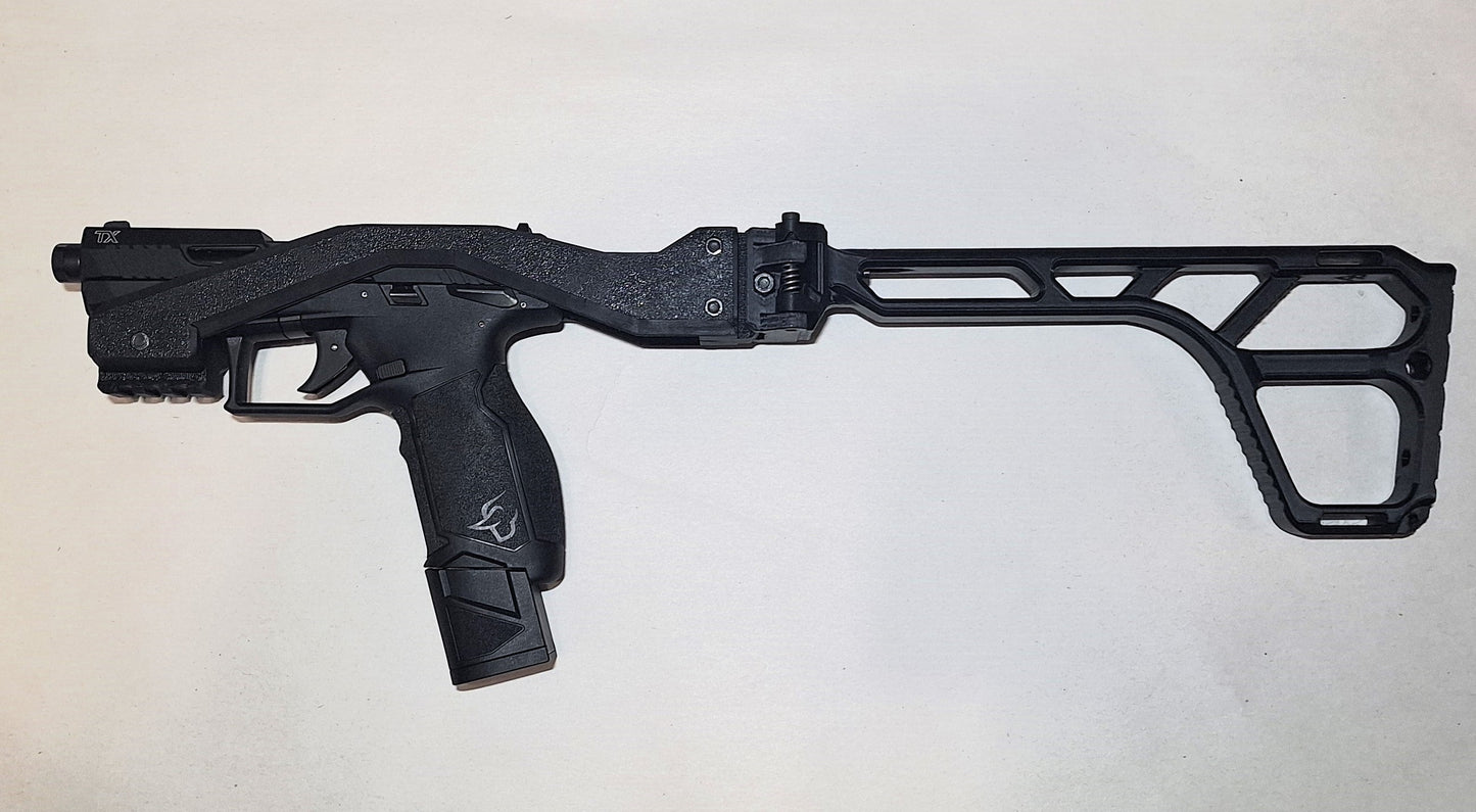 Taurus TX22 firearm with black folding brace chassis kit for tactical use and improved control
