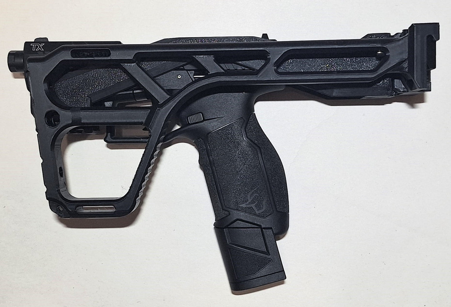 Taurus TX22 chassis and folding brace kit in black with ergonomic grip and Picatinny rail for tactical use