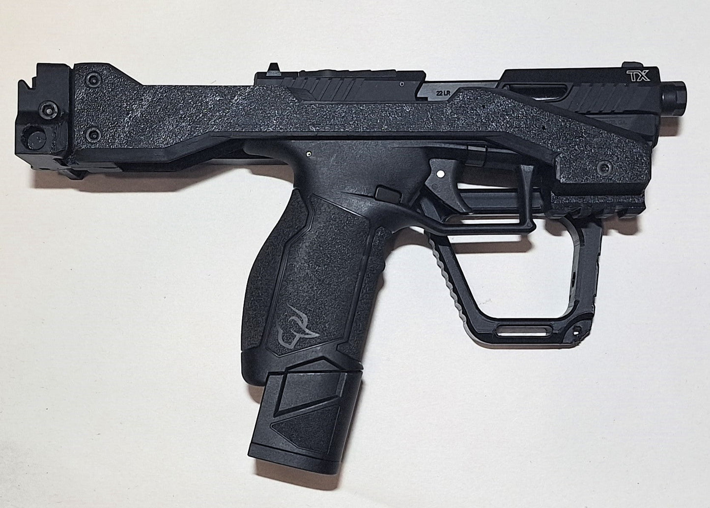 Taurus TX22 with black chassis and folding brace kit for tactical compact use