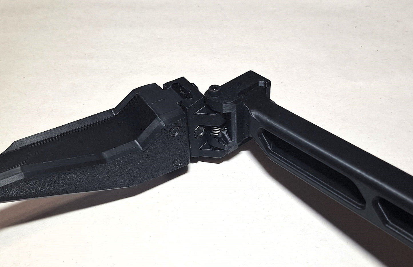 Taurus TX22 Chassis folding brace kit with ergonomic grip and durable black construction