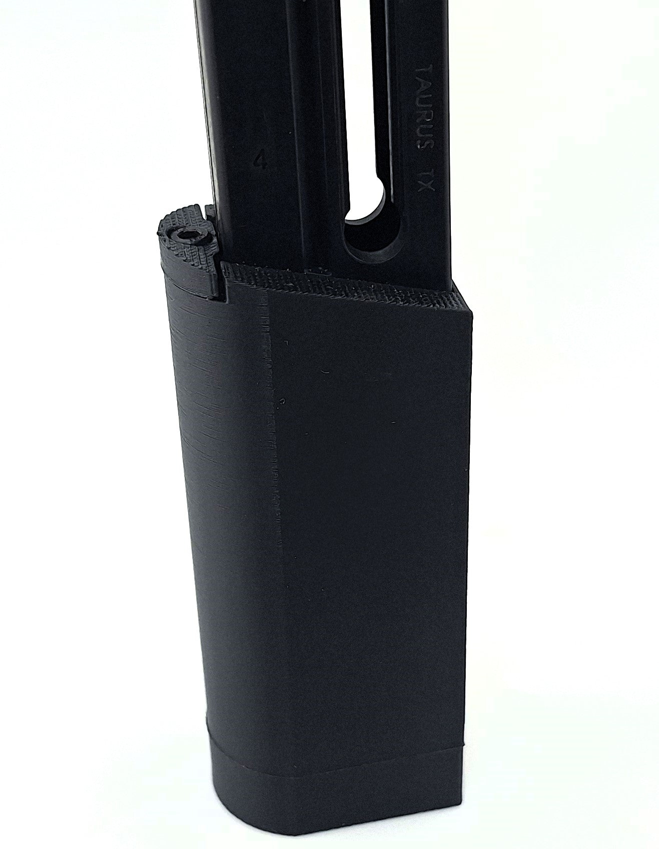Taurus TX22 15-round magazine extension for increased capacity and durability