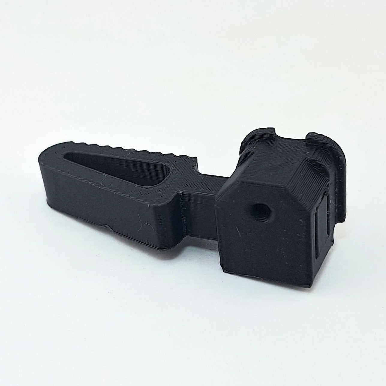 Black TX22 MTN modular charging handle upgrade component for improved control and durability
