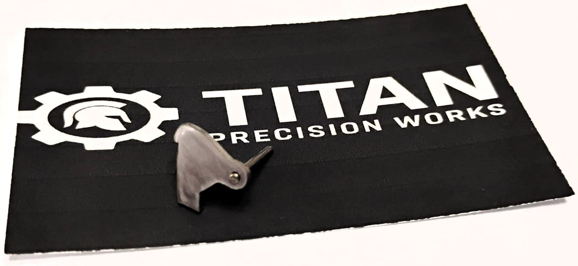 Taurus TX22 ARD trigger disconnector 2-pack precision machined steel parts on Titan Precision Works mat
