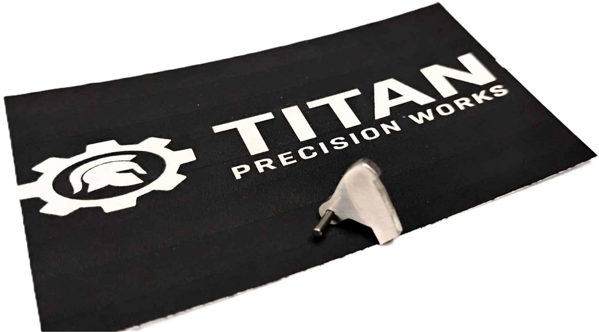 Taurus TX22 ARD trigger disconnector made from 304 steel with corrosion-resistant finish, hand-polished, 2 pack on Titan Precision Works mat