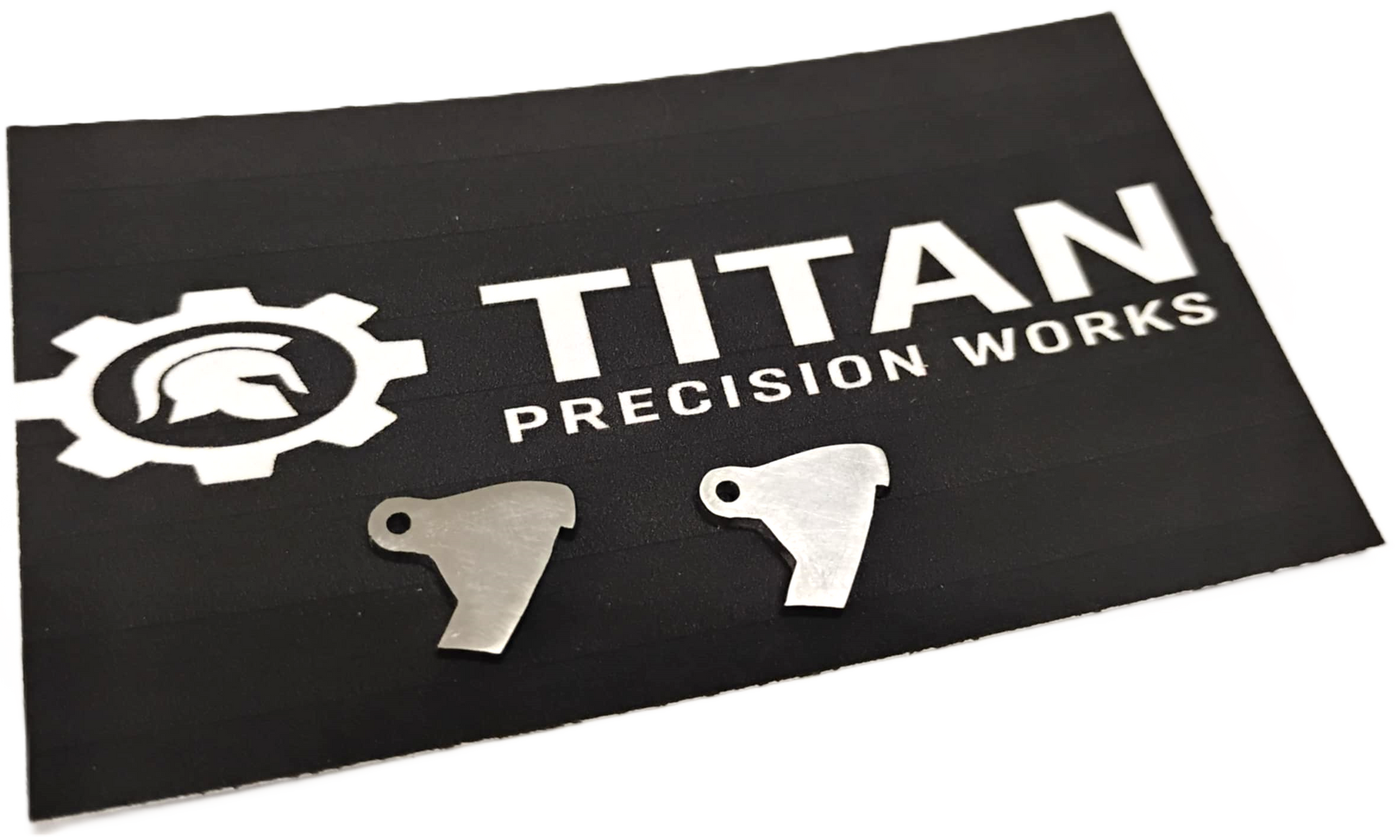 Taurus TX22 ARD trigger disconnector 2 pack made from 304 steel with corrosion-resistant finish on Titan Precision Works mat