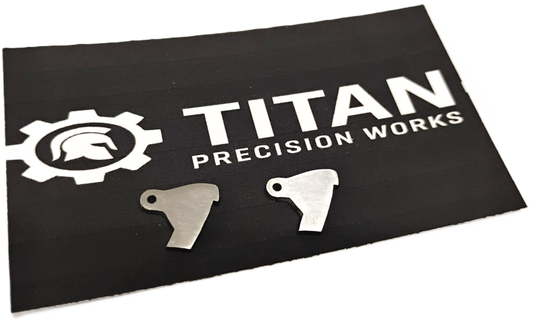 Taurus TX22 ARD trigger disconnector 2 pack made from 304 steel with corrosion-resistant finish on Titan Precision Works mat