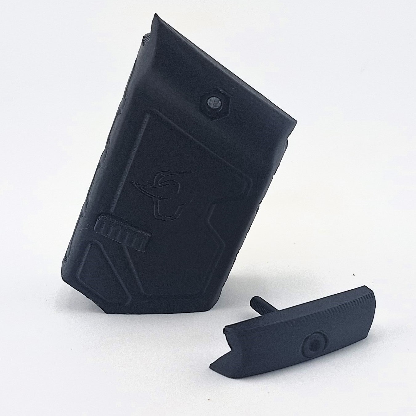 Black TX22 Mag Holder with push-button release designed for Taurus TX22 magazines, durable and secure fit accessory.