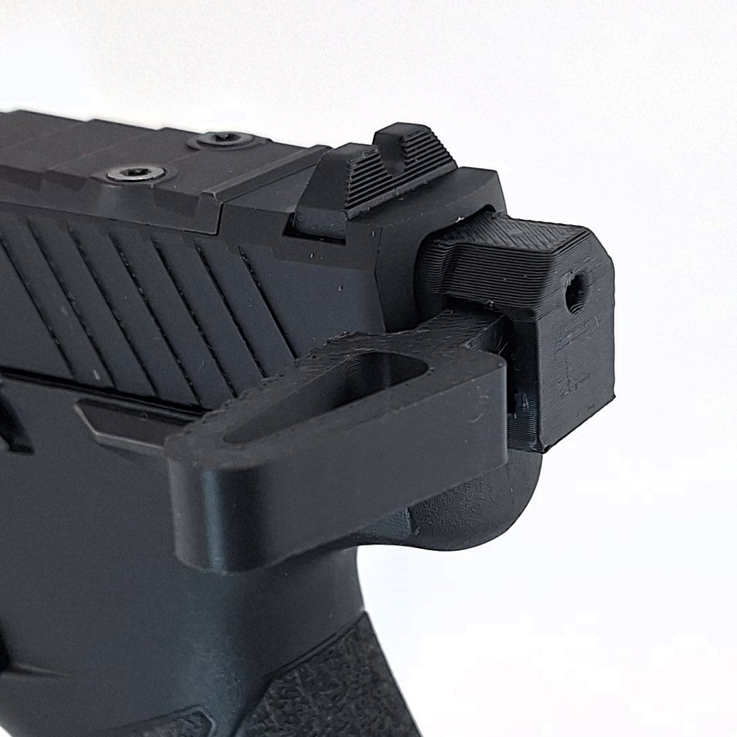 Close-up of Taurus TX22 MTN ambidextrous charging handle with ergonomic design and durable black finish