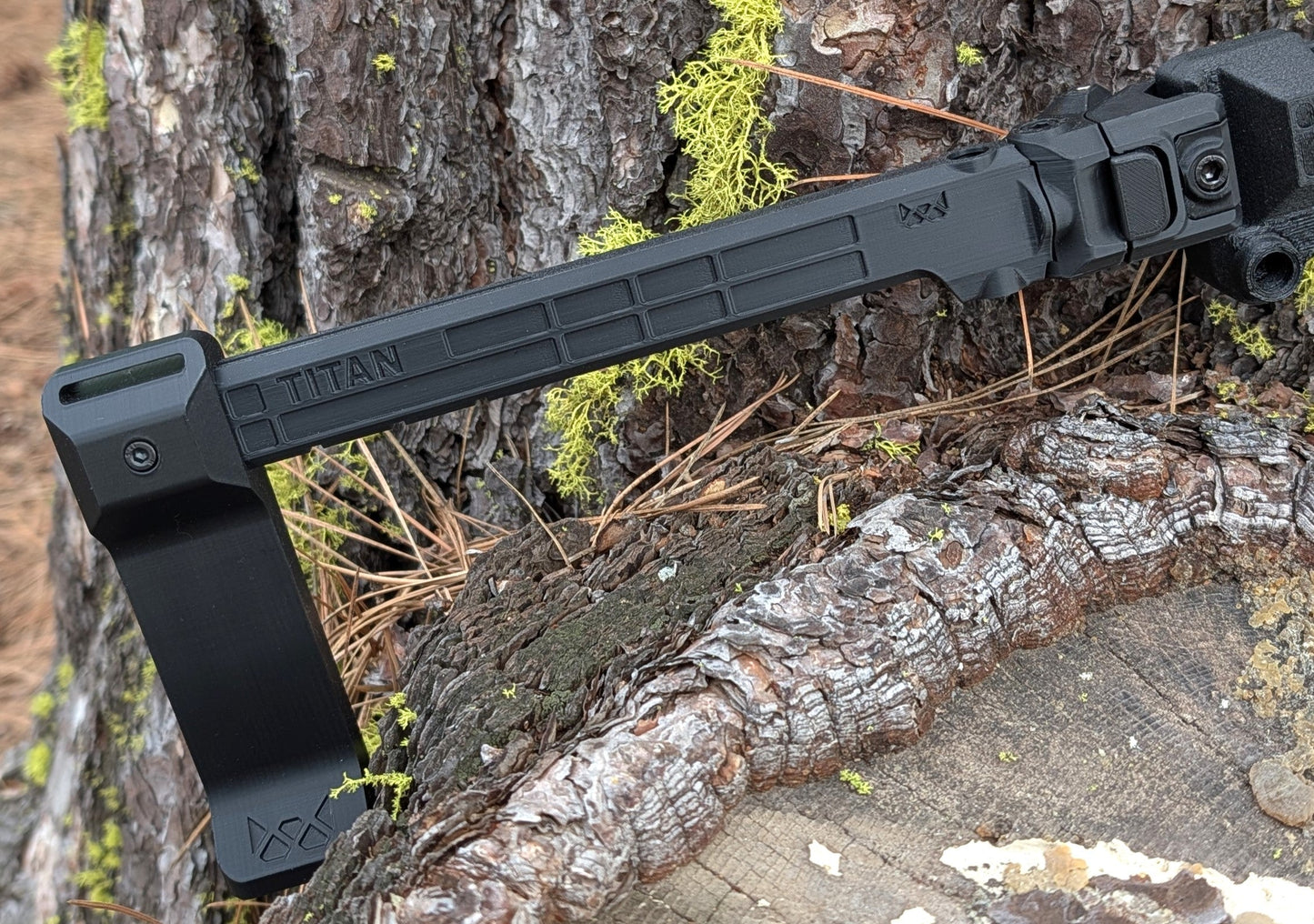 Taurus TX22 Spectre chassis with optic mount and folding arm brace for enhanced control and compactness