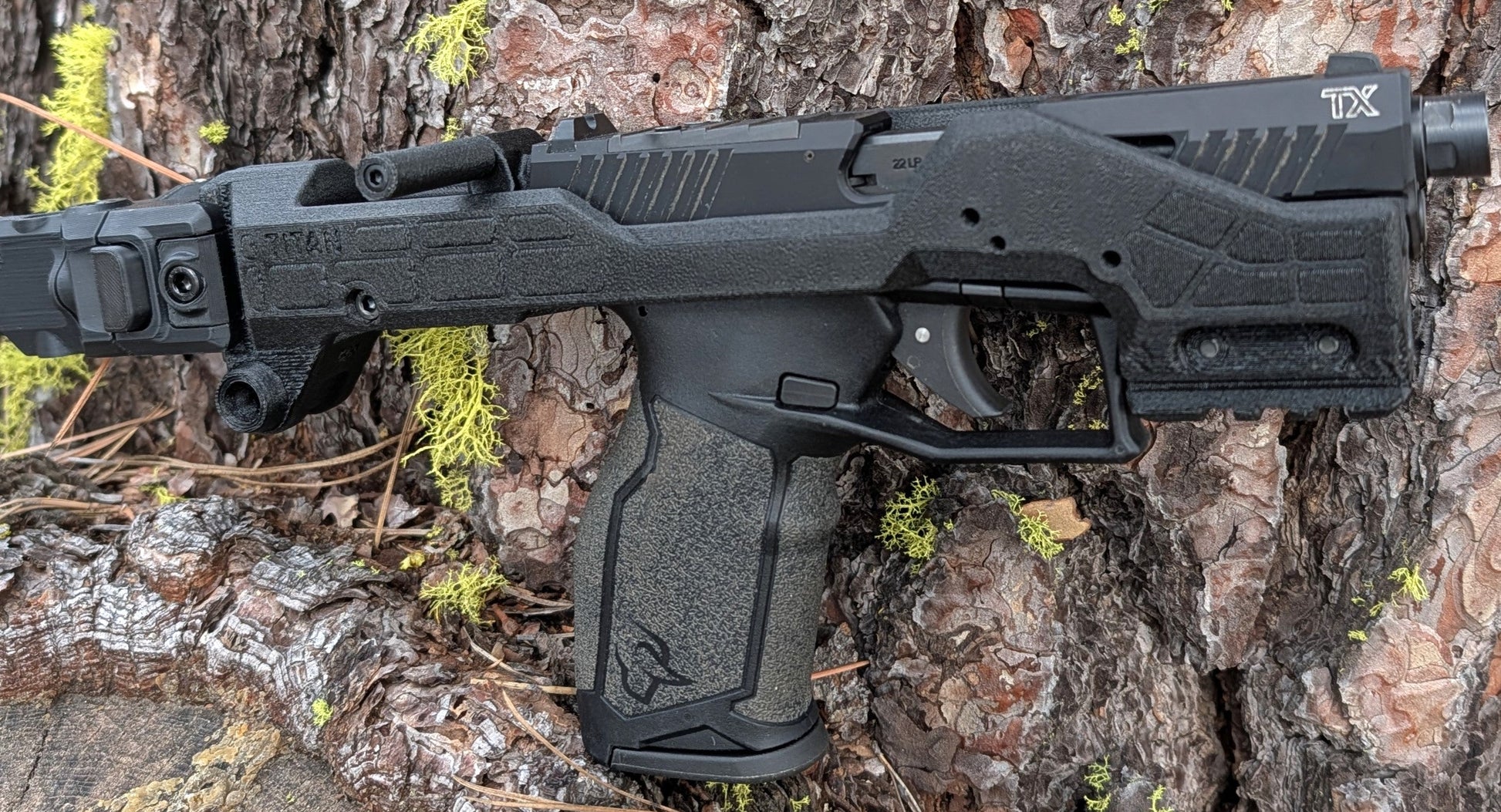 Taurus TX22 Spectre chassis with optic mount and side-folding arm brace for improved control and compactness